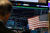 FILE PHOTO: A trader works at his post on the floor at the New York Stock Exchange (NYSE) in New York City, U.S., June 1, 2026.  REUTERS/Brendan McDermid/File Photo